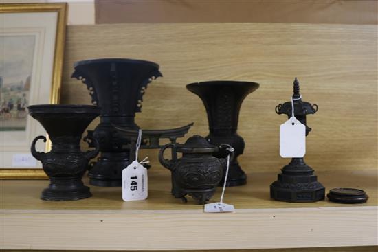 Three Chinese Archaic style bronze vases, various, a small two-handled urn (lacking cover) and a model gateway and lantern